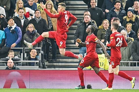 Firmino fires ruthless Liverpool 16 points clear