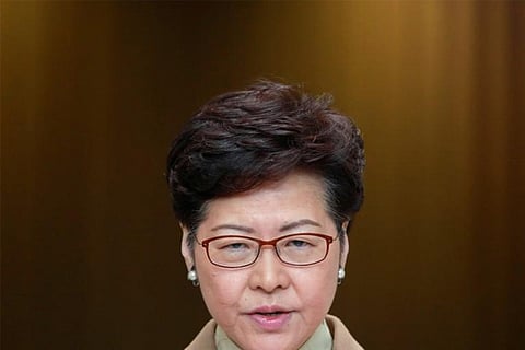 Hong Kong's Lam in Davos charm drive as protests persist