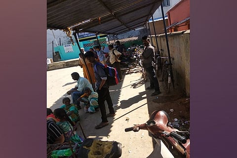 Two-wheelers and rubbish accumulated in the waiting shed area of the Pernambut bus stand, while lack of seats