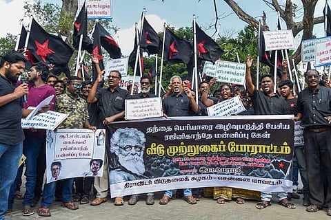 Dravidar Viduthalai Kazhagam activists stage a protest against actor Rajinikanth