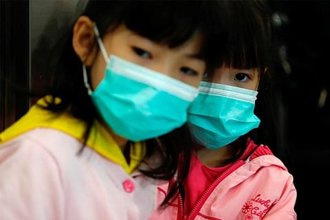 Second Chinese city placed on lockdown over virus: official