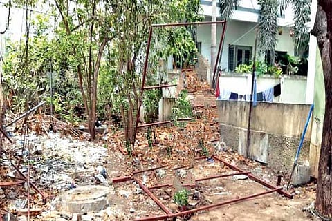 An illegal construction on encroached land near Porur lake