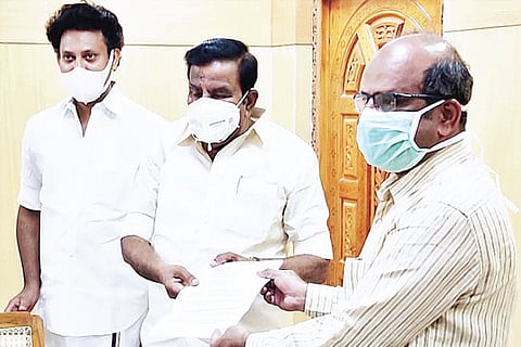 DMK principal secretary KN Nehru handing over a petition to Tiruchy Collector on Wednesday