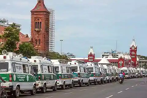 Ambulances parked in front of the Victoria Public Hall building in Chennai
