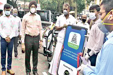 Municipal Administration Minister SP Velumani launching the app in Coimbatore on Thursday