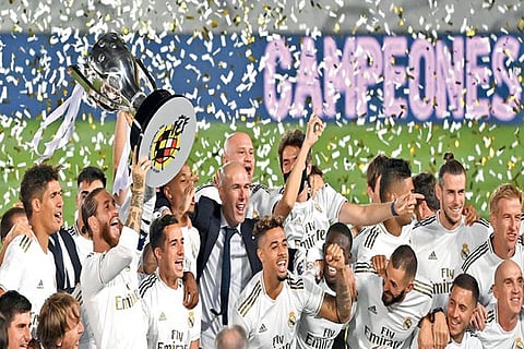 Real Madrid players and manager celebrate the club?s La Liga triumph