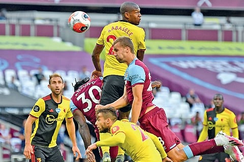 Tomas Soucek (in the air) heads home West Ham?s second goal against Watford