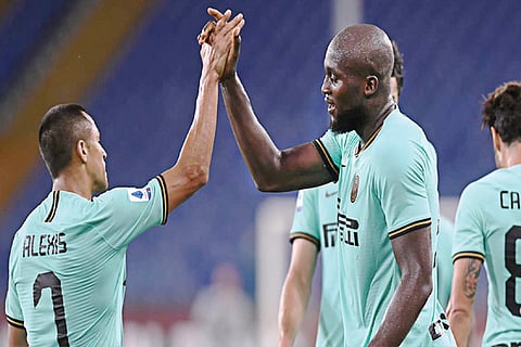 Alexis Sanchez (left) and Romelu Lukaku celebrate Inter Milan?s win
