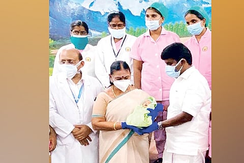 Health Minister Vijaya Baskar handed over the baby to Social Welfare Minister V Saroja