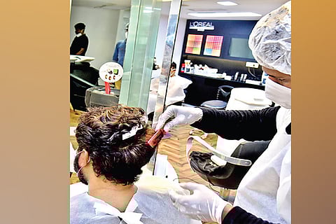 Salons reopen, crowd not to expected level