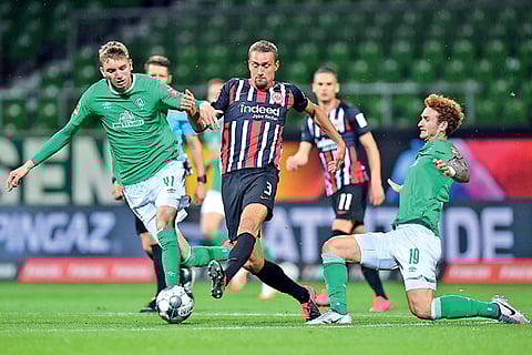 Eintracht?s Stefan Ilsanker (centre) needed only 19 seconds to get his first goal