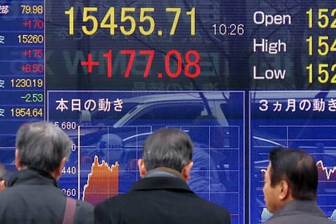 Asian shares mostly higher ahead of Fed policy meeting