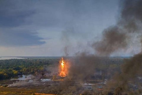 An aerial view of the Baghjan oil field engulfed in fire, in Tisukia, Assam