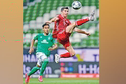 Robert Lewandowski (right) netted the winner for Bayern Munich