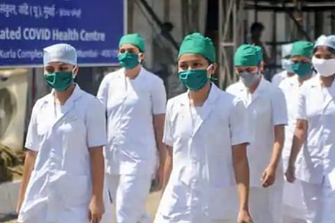 Amid surge in COVID cases, nurses ring alarm bells over safety concerns