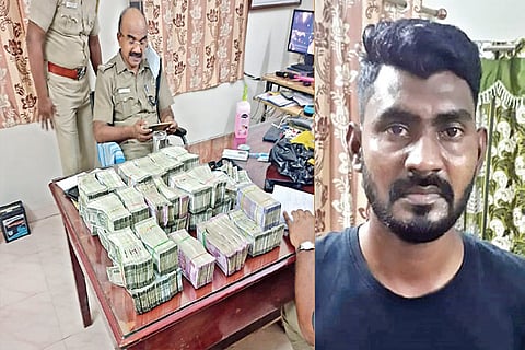 Currency bundles seized from under a bike seat; Nathar Sahib
