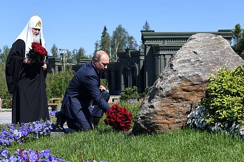 Putin visits huge army church ahead of vote on extending his rule