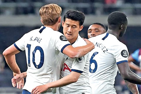 Tottenham players are elated after defeating West Ham 2-0