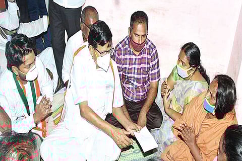 TNCC president consoling the family of father-son duo who lost their life due to police torture