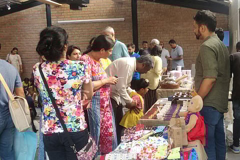 The crowd at the organic farmers? market on Sunday