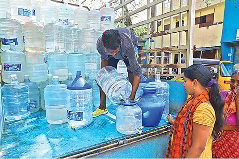 People fill their water cans at wholesale points due to the ongoing strike by the production units