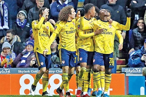 Arsenal beats Portsmouth to cruise into FA Cup quarter-finals