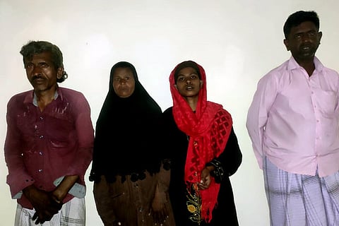 The accused with her parents