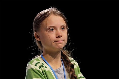 Brussels seeks new climate powers as Thunberg looks on
