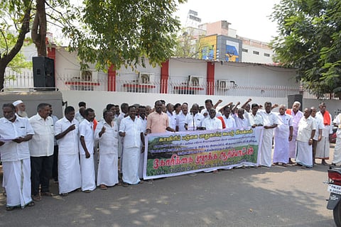 Members of farmers associations staging a demonstration in front of the HPO in Thanjavur on Wednesday