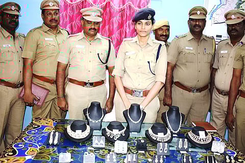 Superintendent of Police S Deepa Ganiger and her team with the recovered jewels