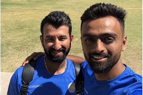 Saurashtra?s Cheteshwar Pujara (left) and Jaydev Unadkat