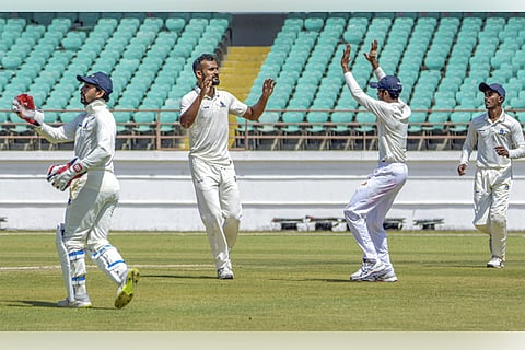 Bengal players celebrate the wicket of Saurashtra?s Avi Barot