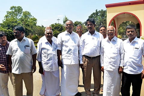 CPM state secretary K Balakrishnan in Coimbatore on Friday with petition