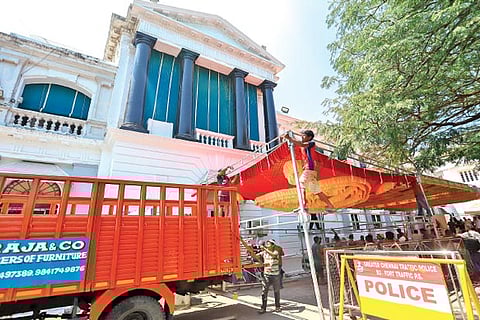 A makeshift shelter being set up to provide cover for media persons at the Secretariat on Monday