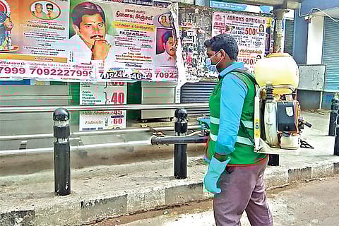 Conservancy workers cleaning the city