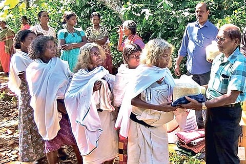 Paniyar tribes in Western Ghats receiving help from members of Tribal Foundation during the lockdown