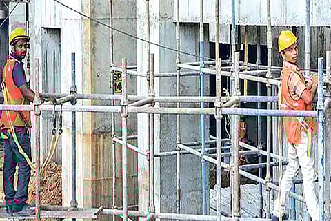 File photo of migrant workers at a construction site