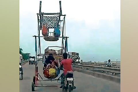 DeTect: Video of man pushing Ferris wheel, at least 2 yrs old