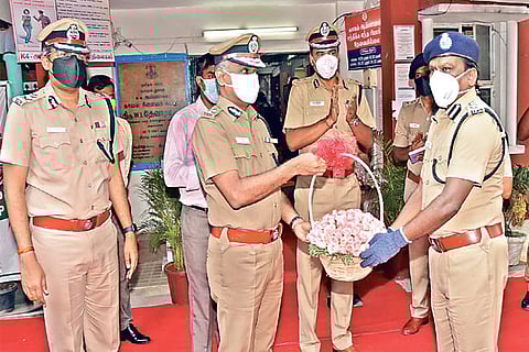 City police chief AK Viswanathan receives Anna Nagar Deputy Commissioner MS Muthuswamy