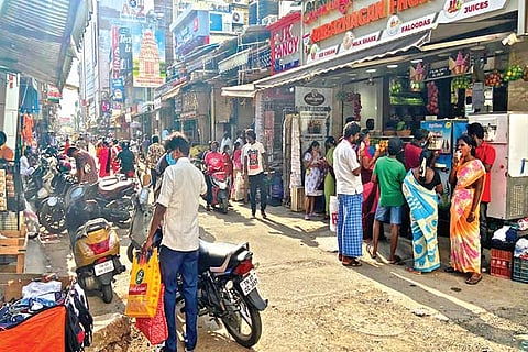 There is no social distancing among customers on Raganathan Street