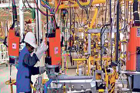 Post COVID cool-off, factory output surges to 13-year high in October