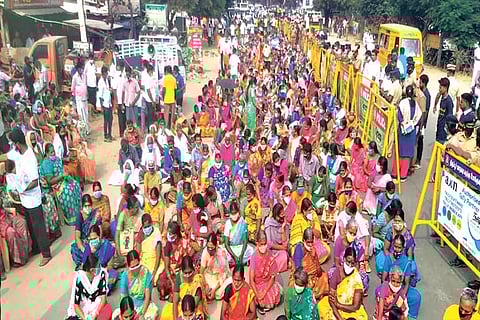 Villagers staging a road roko in Tirupur on Monday