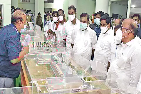 Chief Minister inspecting the model of Tirupur Smart City projects at the Collectorate on Friday