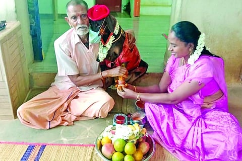 Krishnamurthy along with Abhirami and a relative during the bangle ceremony