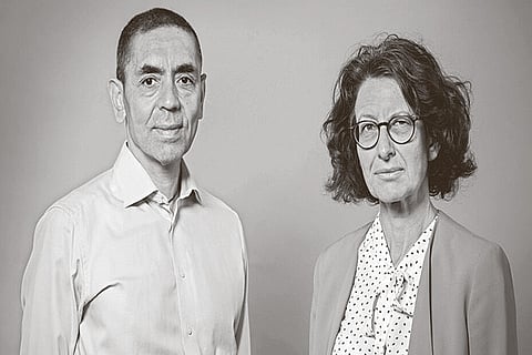 Dr. Ugur Sahin, left, and Dr. ?zlem T?reci, the couple who founded BioNTech