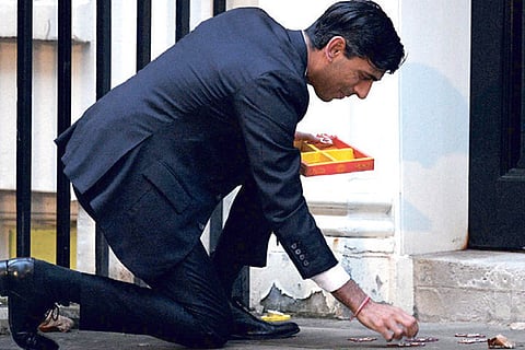 UK Chancellor Rishi Sunak lit candles outside 11 Downing Street on Friday to mark the festival