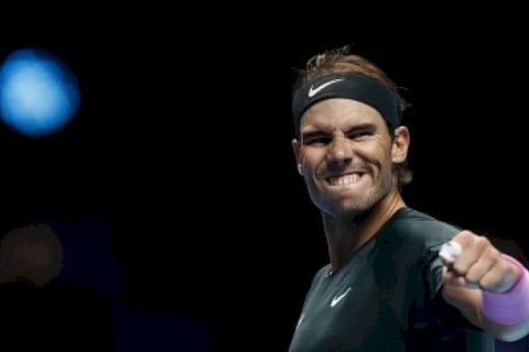 Nadal battles past Tsitsipas to reach semi-finals at ATP Finals