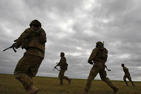 Australian minister says war crimes report on unlawful killing of Afghan civilians made her 'ill'