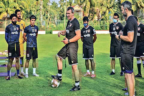 CFC head coach Csaba Laszlo and boys during training
