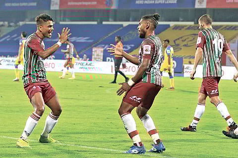 ATKMB duo of Prabir Das and Roy Krishna celebrate the latter?s winning goal against KBFC